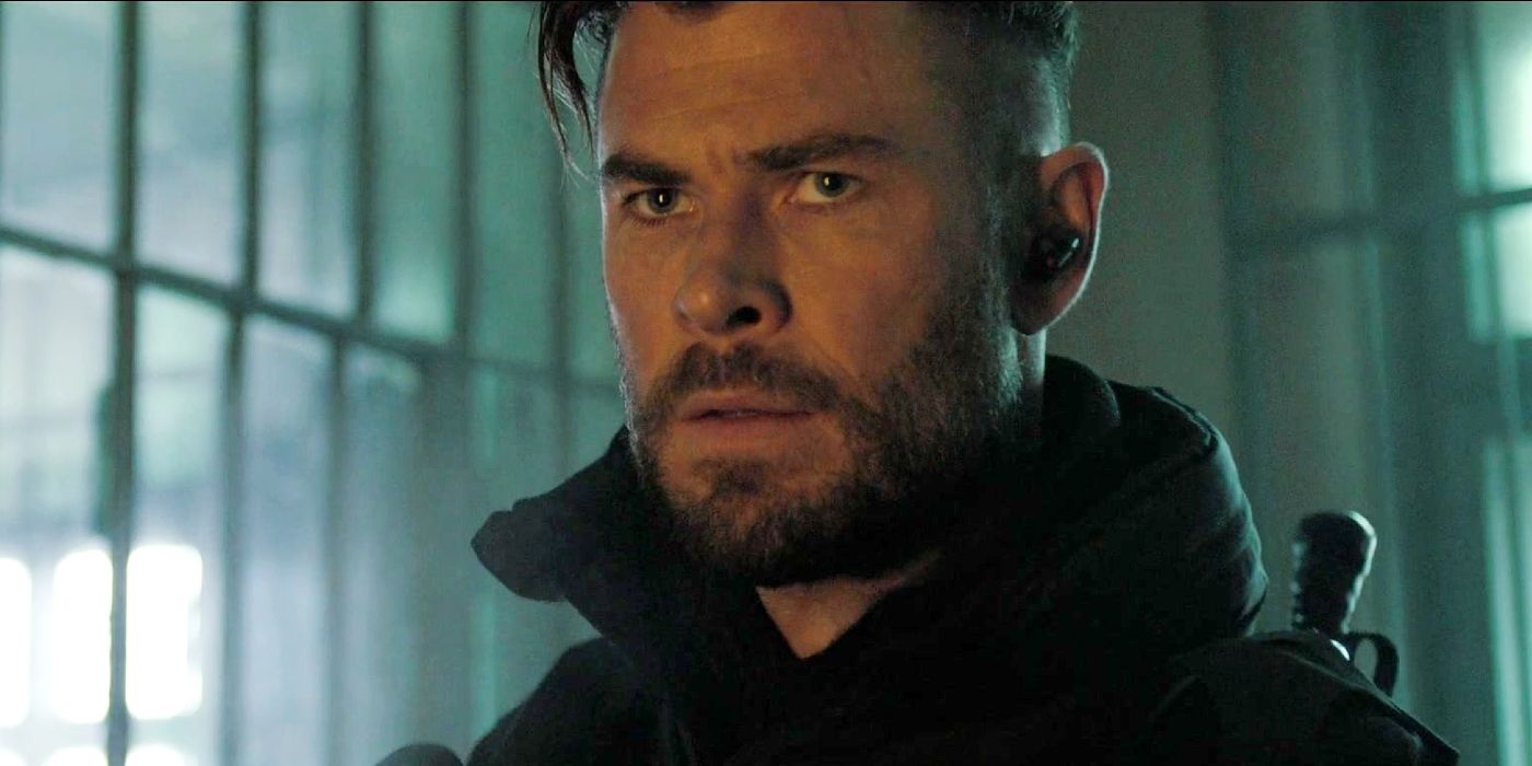 Chris Hemsworth looking concerned as Tyler Rake in Extraction 2.
