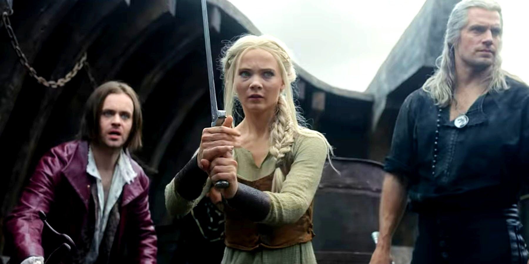 Ciri wielding a sword with Geralt and Jaskier behind her in The Witcher season 3