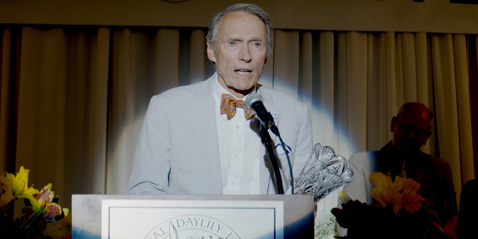 Clint Eastwood at a podium in The Mule