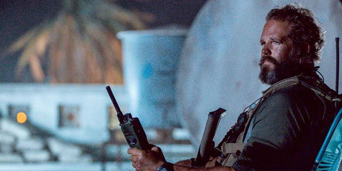 David Denman looking sideways in 13 Hours