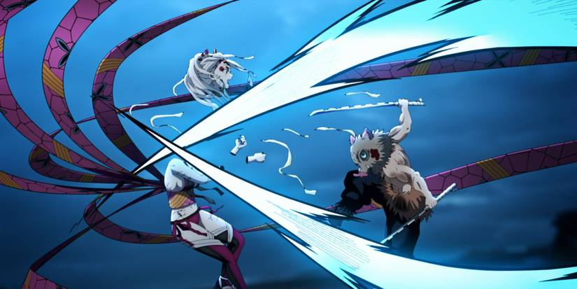 Demon Slayer's Inosuke using Beast Breathing to sever Daki's head