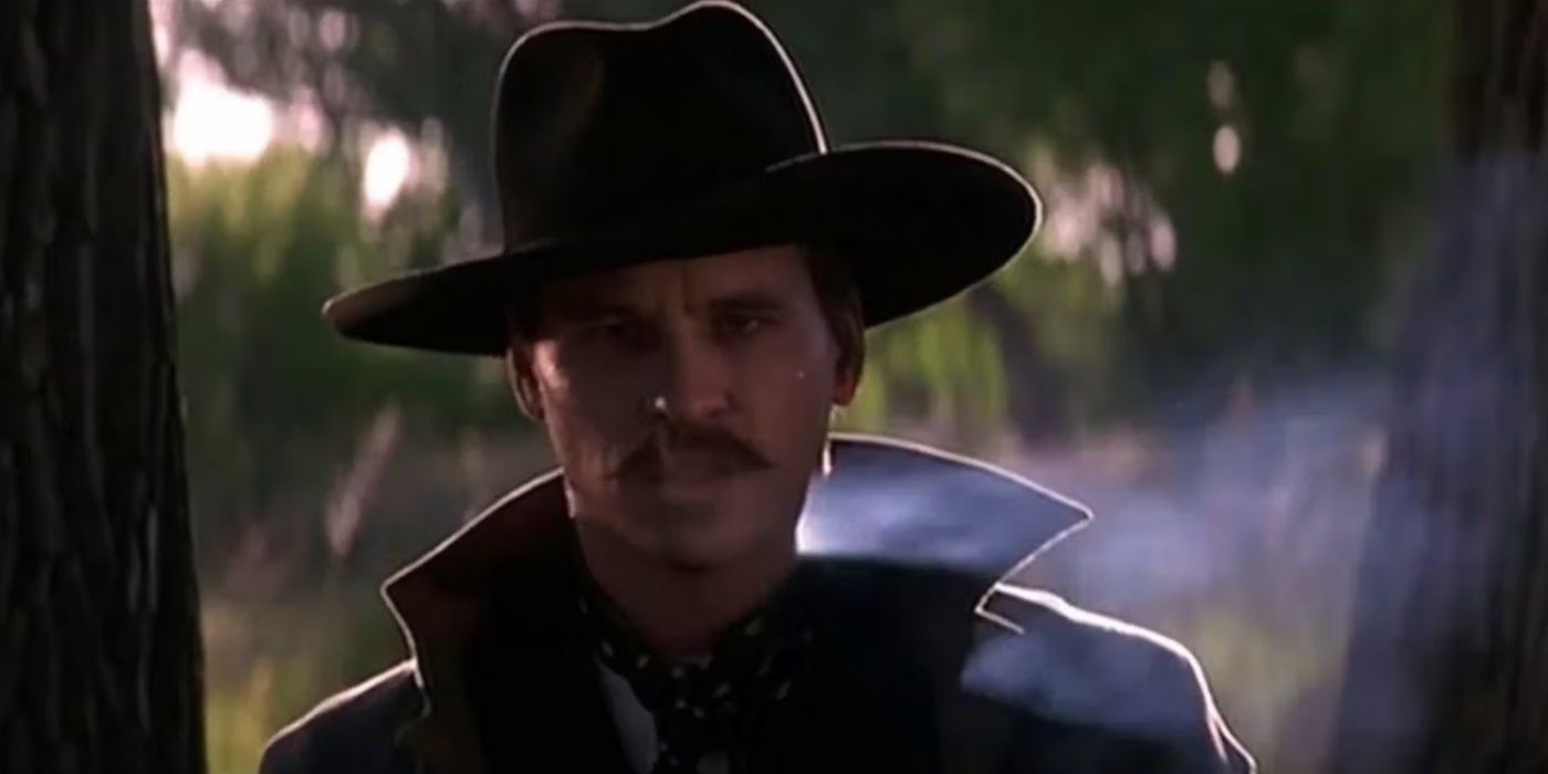 Doc Holliday approaches Johnny Ringo from the shadows in Tombstone