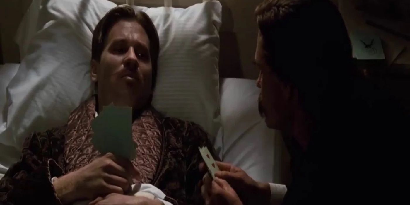 Doc Holliday playing poker with Wyatt Earp on his death bed in Tombstone