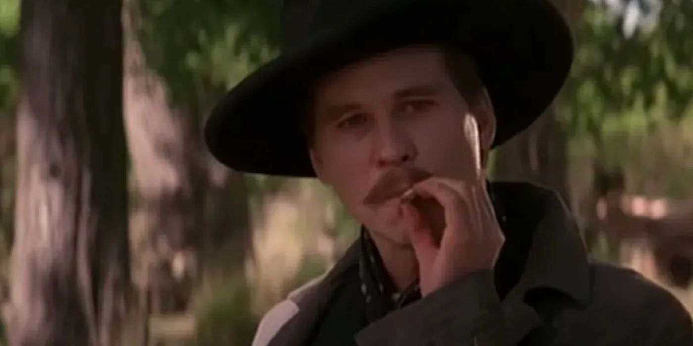 Doc Holliday talking to Johnny Ringo while smoking in Tombstone