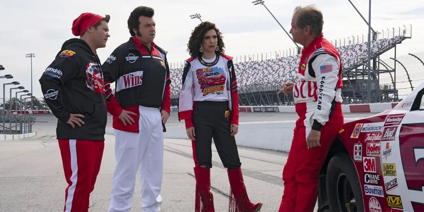 Dusty Davis talks to Kelvin, Judy, and Jesse on pit lane in The Righteous Gemstones