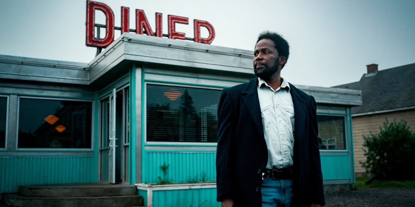 Boyd stands in front of the diner in From