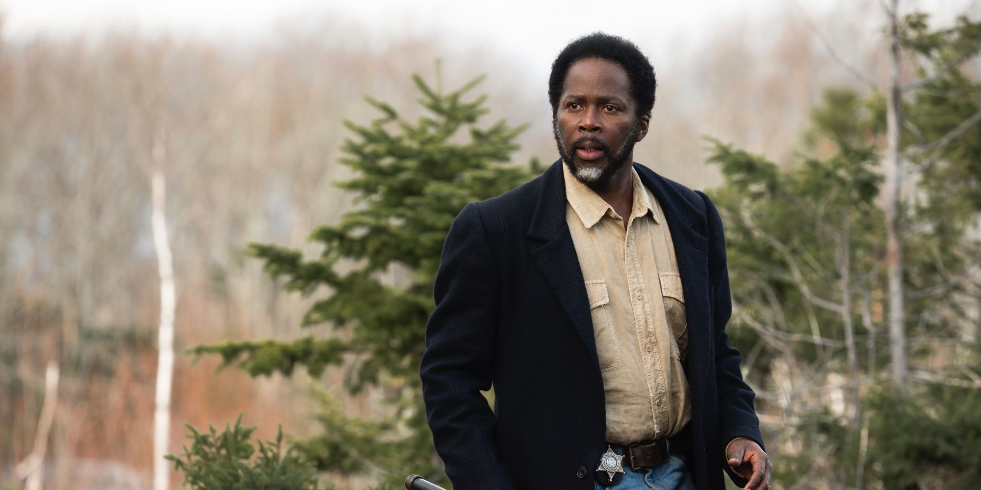 Harold Perrineau as Boyd in front of Christmas trees in the From season 2 finale