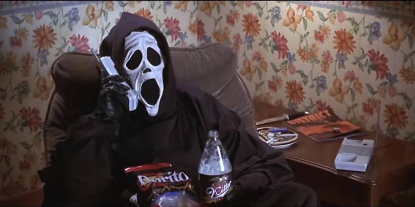 Ghostface drinks beer and eats chips while calling his victims in Scary Movie
