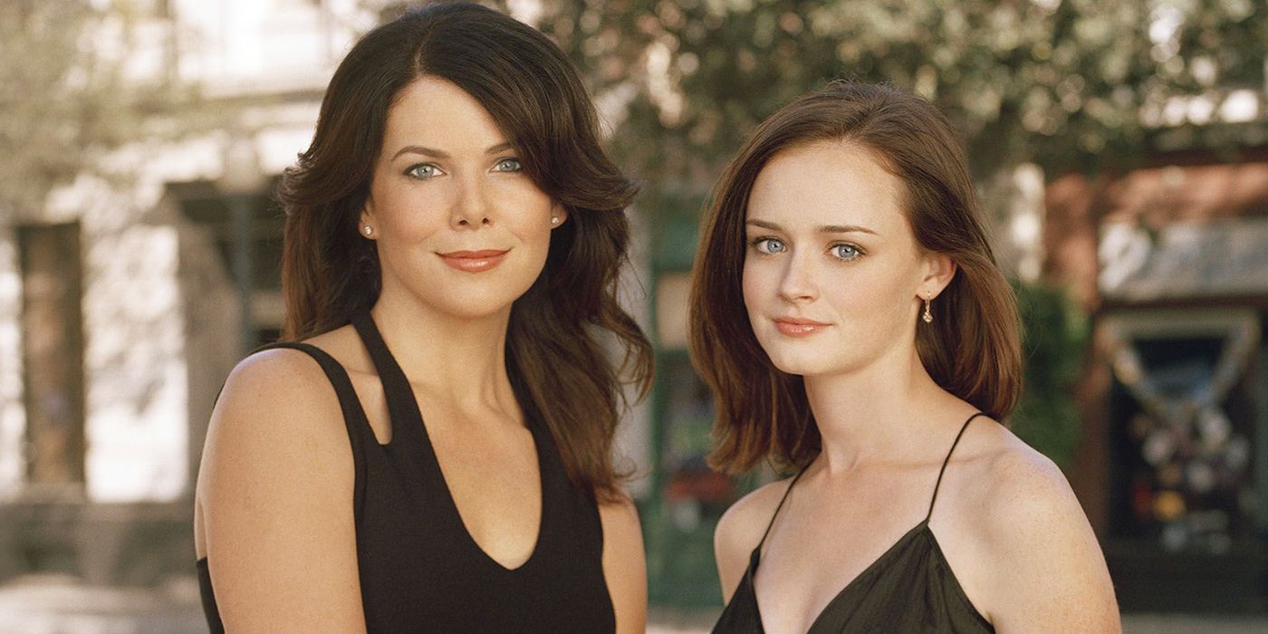 Rory and Lorelai from Gilmore Girls smile at the camera.