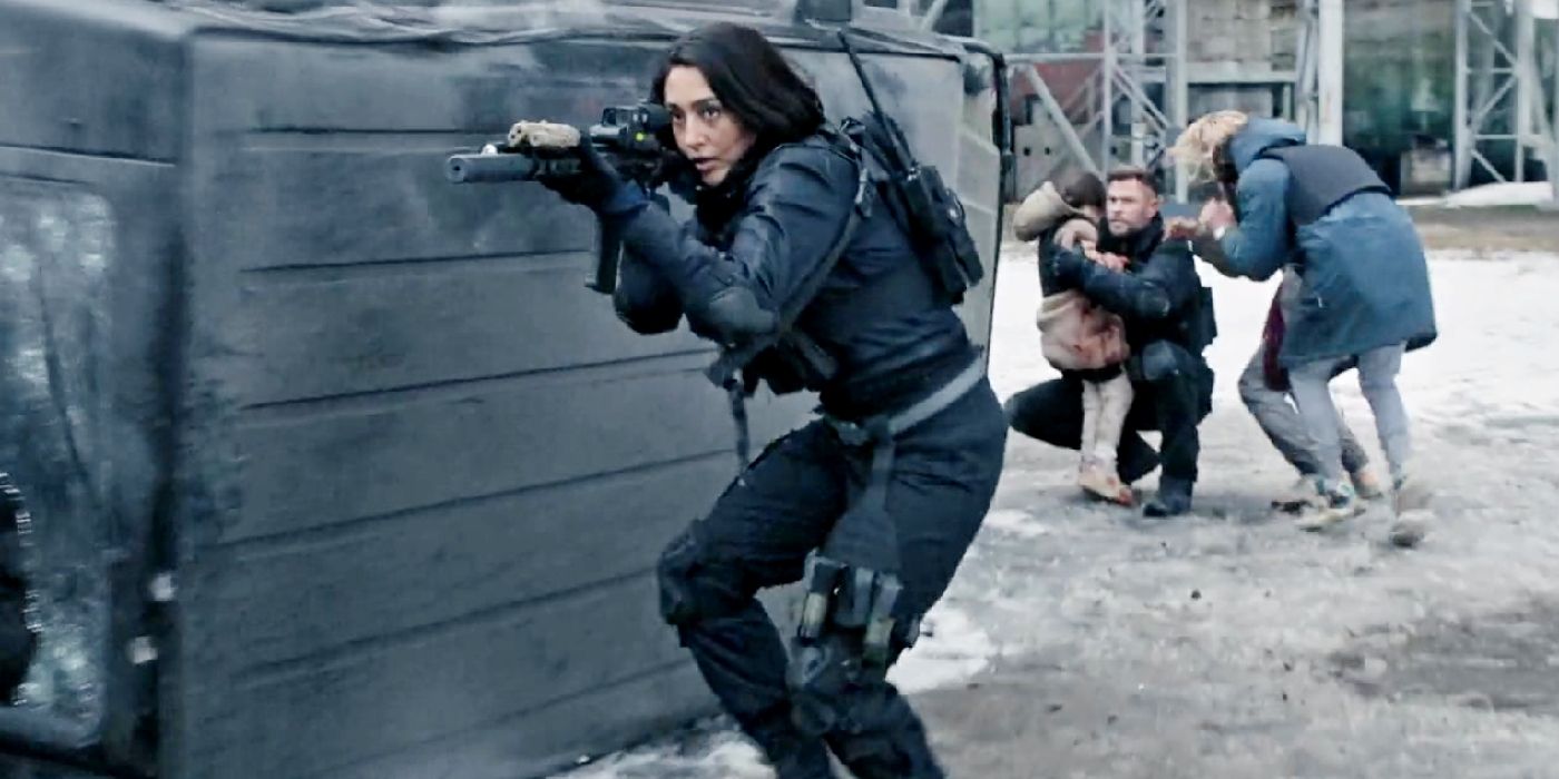 Golshifteh Farahani as Nik shooting a gun in Extraction 2.