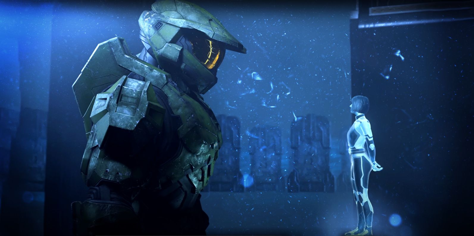 Masterchief up close in profile looking down on a small Cortana