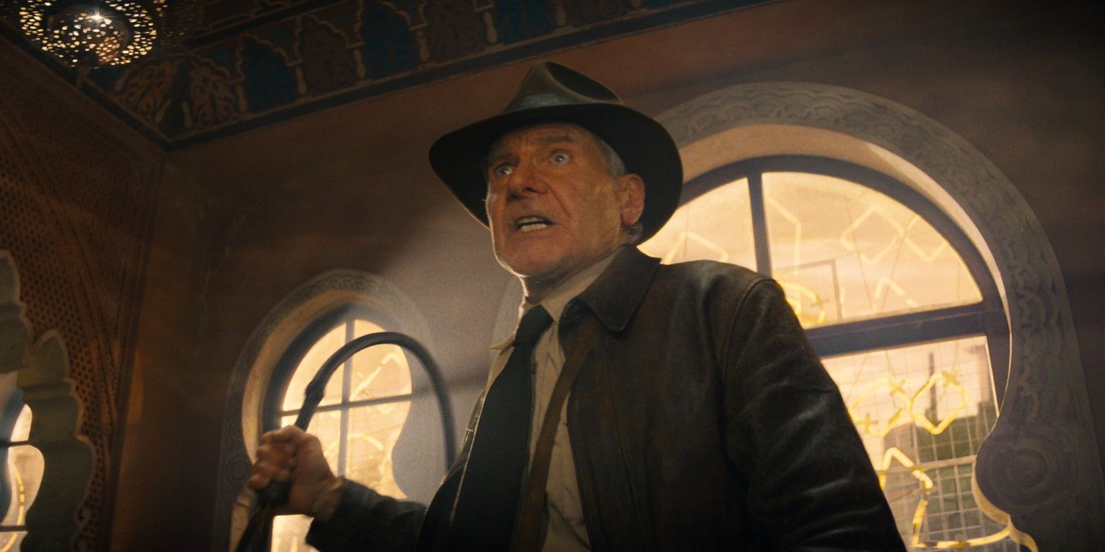 Harrison Ford in Indiana Jones and the Dial of Destiny with his whip