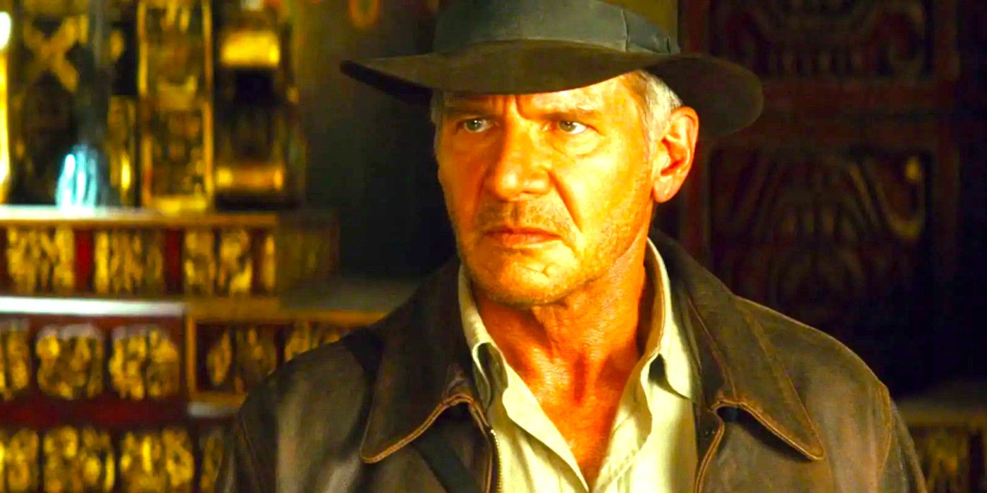 Harrison Ford in Indiana Jones and the Kingdom of the Crystal Skull in his iconic leather jacket and fedora, looking grouchy amid sparkling golden treasure