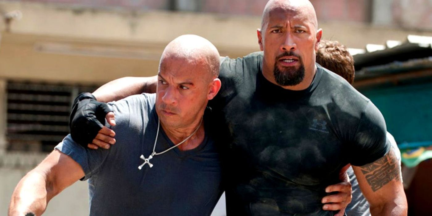 Hobbs holding on to Dom in Fast and Furious 5