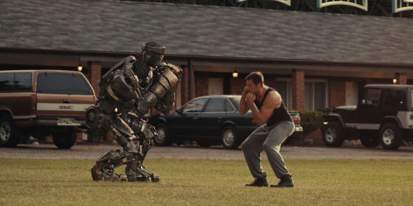 Hugh Jackman shadow boxes a robot in Real Steel.