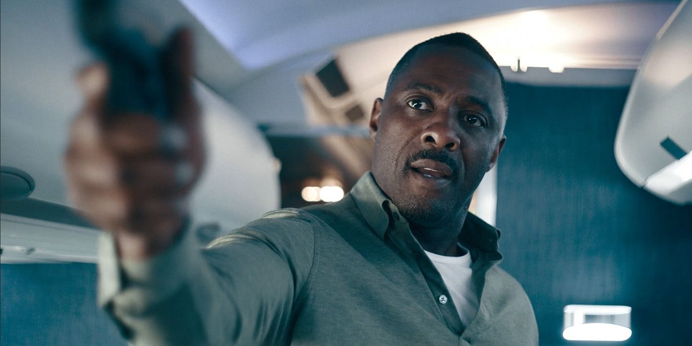 Idris Elba points a pistol in Hijack episode 2