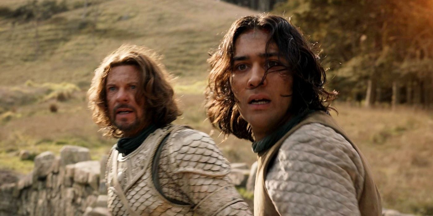 Lloyd Owen and Maxim Baldry as Elendil and Isildur looking concerned in The Rings of Power.