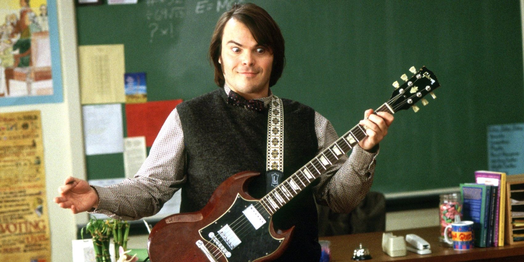 Jack Black with a guitar in School of Rock