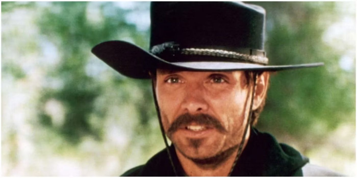 Johnny Ringo looks worried at his tombstone