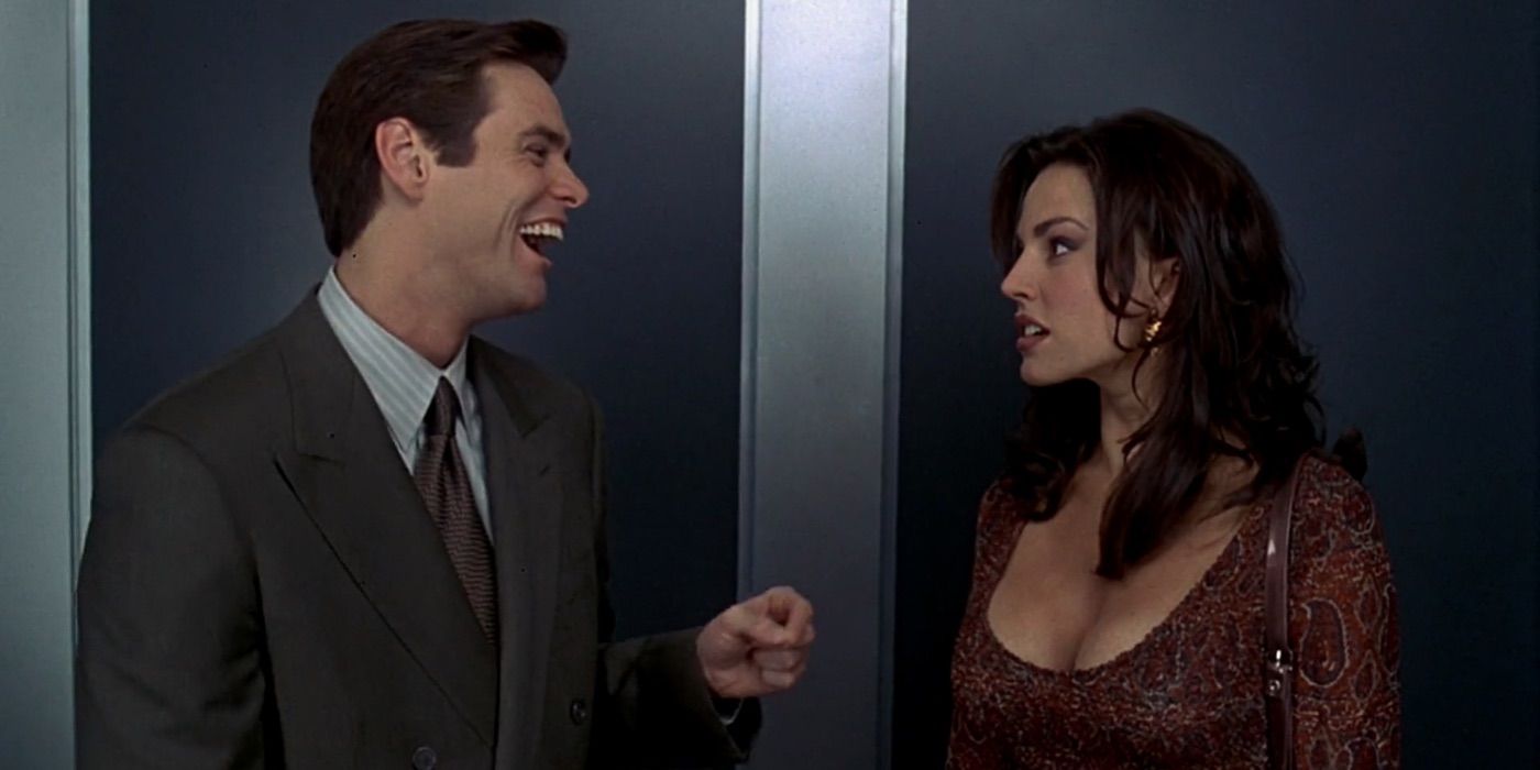 Fletcher talks to a woman in an elevator in Liar Liar 