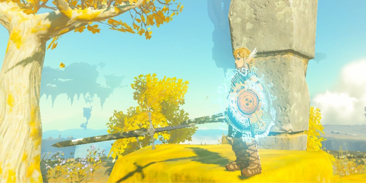 Link segurando uma espada de duas mãos que foi fundida com uma espada de uma mão em Tears of the Kingdom.