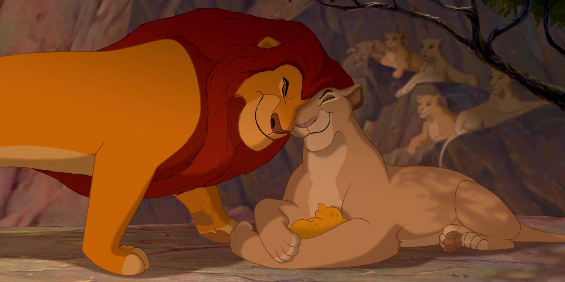 Mufasa embraces his wife as she holds onto Simba in The Lion King