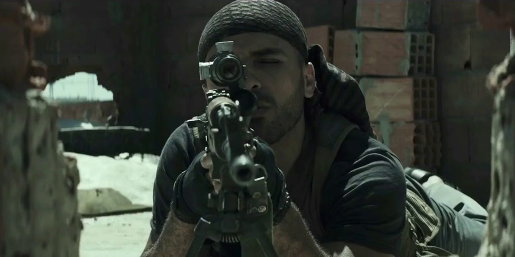 Mustafa using a sniper rifle in American Sniper