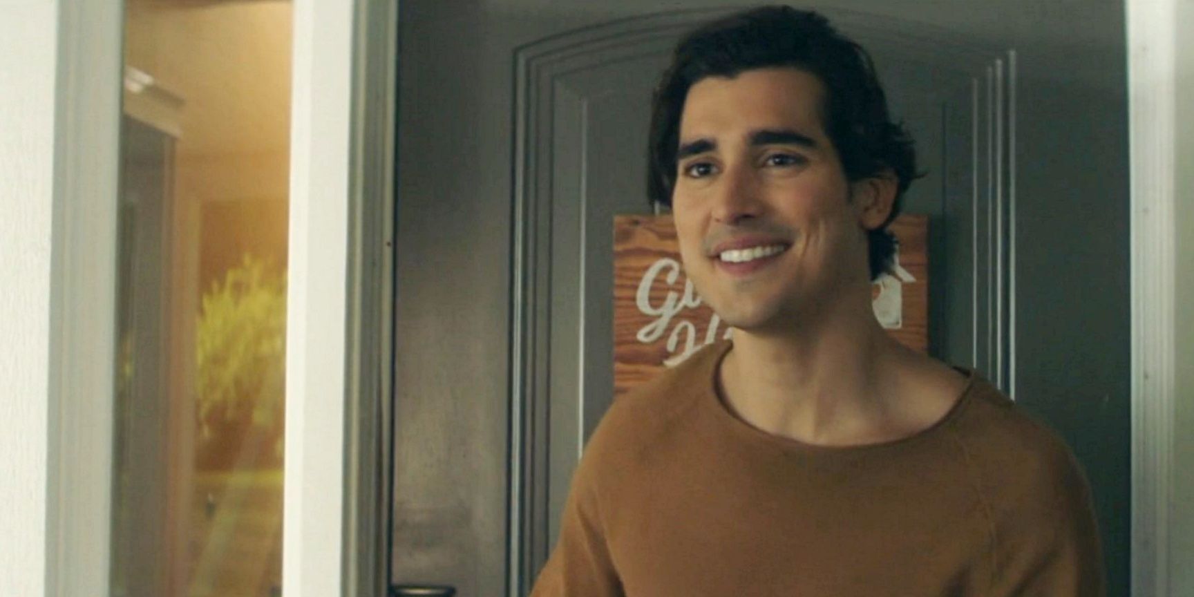 Tristan wears a brown sweater in the Nancy Drew season 4 premiere.