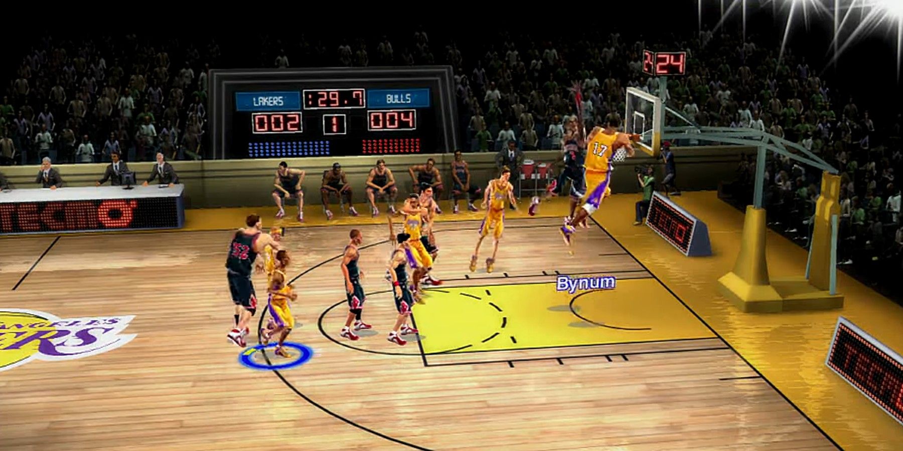 Screenshot of NBA Unrivaled showing a Lakers player dunking