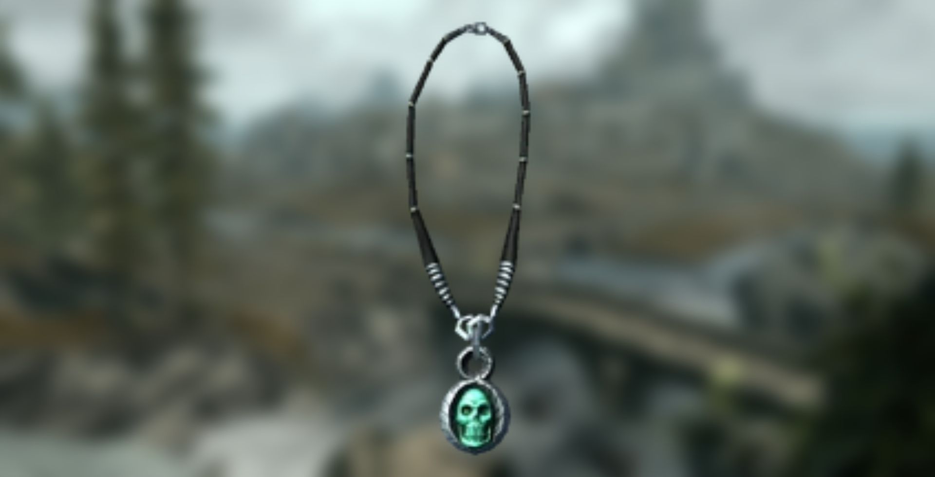 A render of a necromancer amulet against a blurry screenshot of Skyrim.