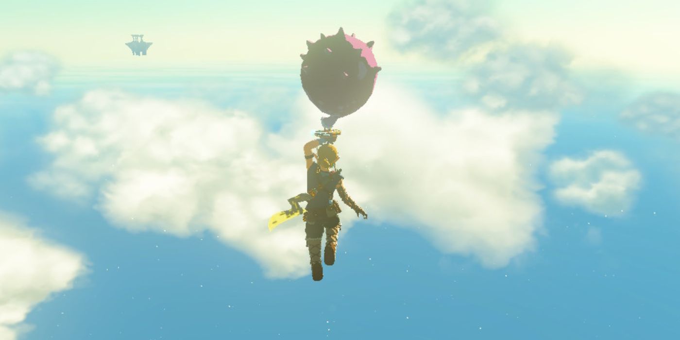 Link flutuando no ar enquanto segura um Octo Balloon Shield em Tears of the Kingdom.