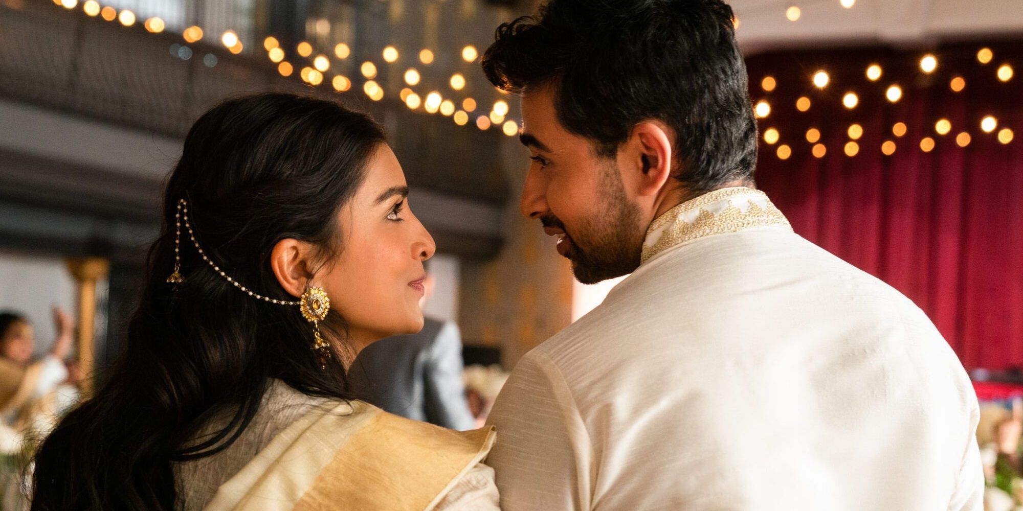 Ravi and Asha gaze at each other in Wedding Season
