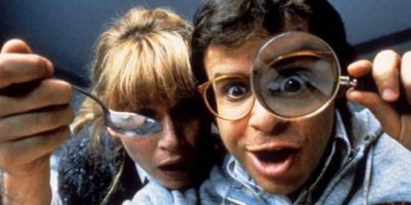 Rick Moranis looking through a magnifying glass in Honey I Shrunk The Kids