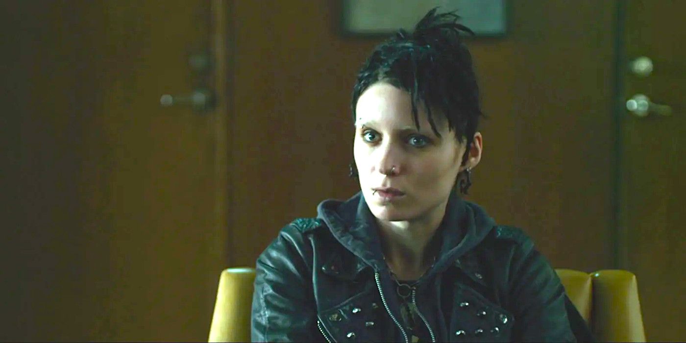 Rooney Mara in The Girl With The Dragon Tattoo looking very severe in a black leather jacket with goth makeup and black hair