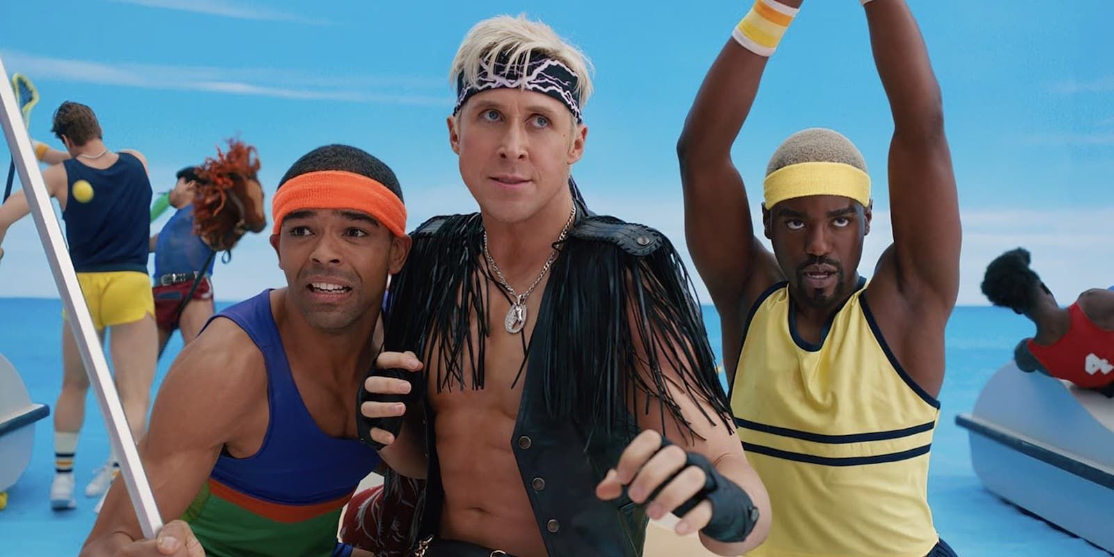 Ryan Gosling, Ben-Adir, and Ncuti Gatwa as Kens all making a pose in Barbie