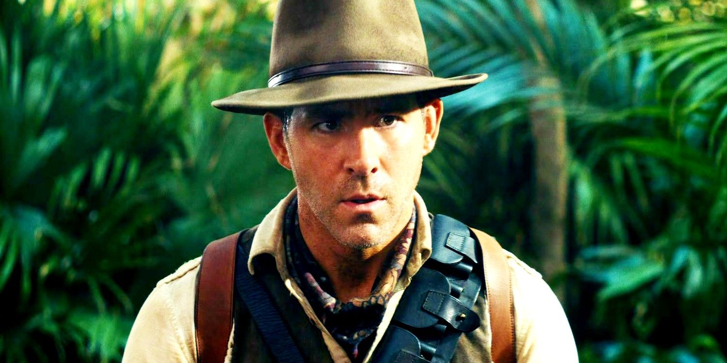 Ryan Reynolds wearing a fedora in the jungle in Red Notice