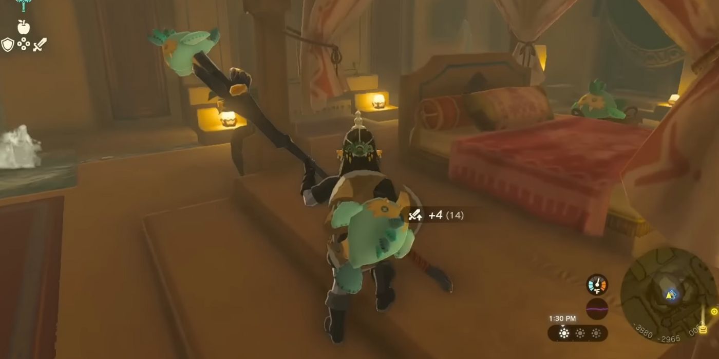 Conecte-se com um brinquedo Sand Seal fundido a uma lança e um escudo em Tears of the Kingdom.