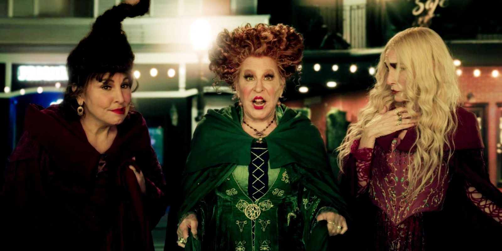 Sanderson sisters walking through the streets in Hocus Pocus 2