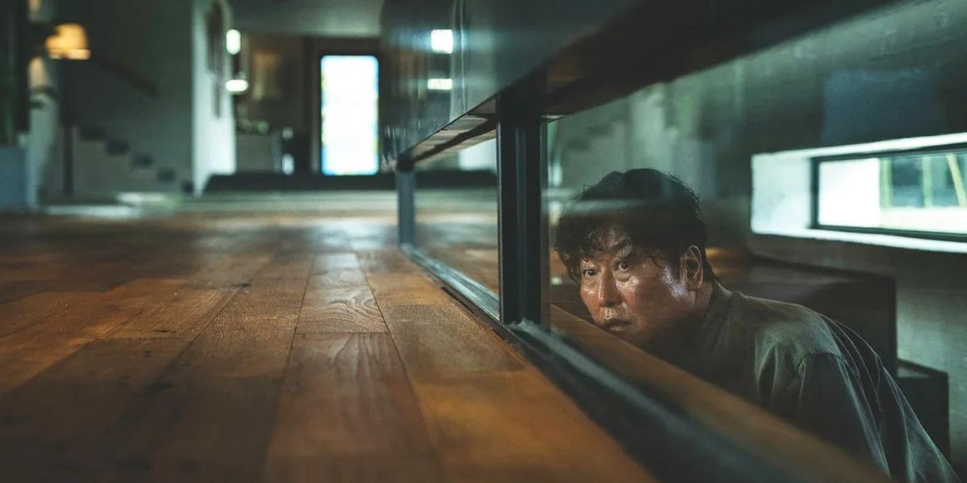 Song Kang-ho looks up from the basement in Bong Joon-ho's Parasite