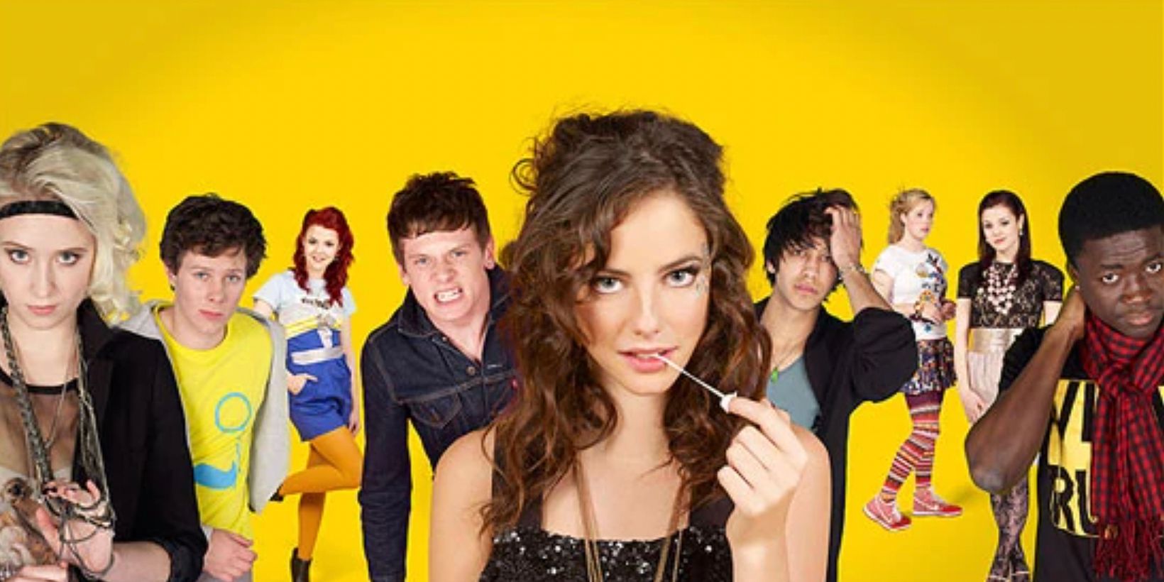 The cast of Skins season 4 against a yellow background with Effy pulling her gum in the center