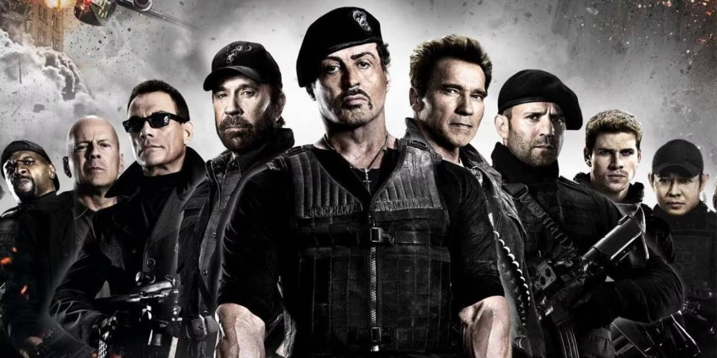 The cast lined up in front of a grey background in The Expendables 2 