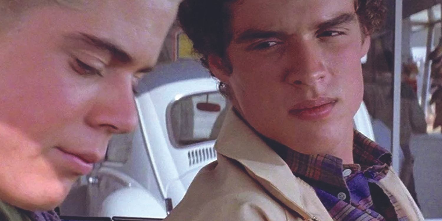 Ponyboy and Randy inside a car in The Outsiders