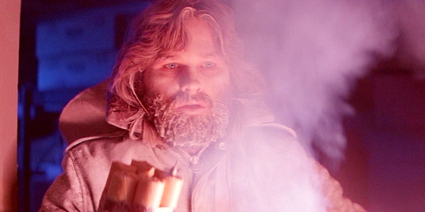 Kurt Russell holding dynamite in The Thing.