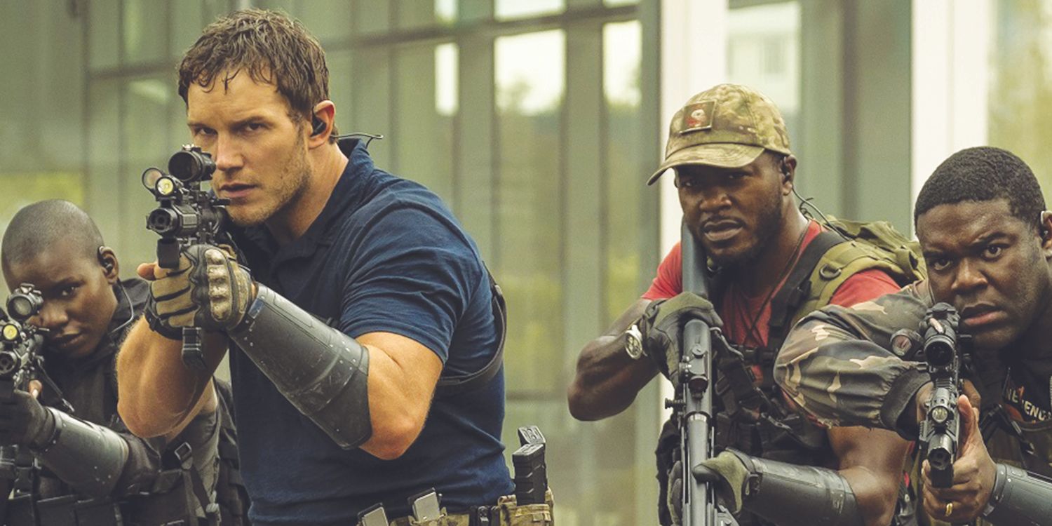 Chris Pratt as James Daniel "Dan" Forester Jr. with others aiming guns in The Tomorrow War