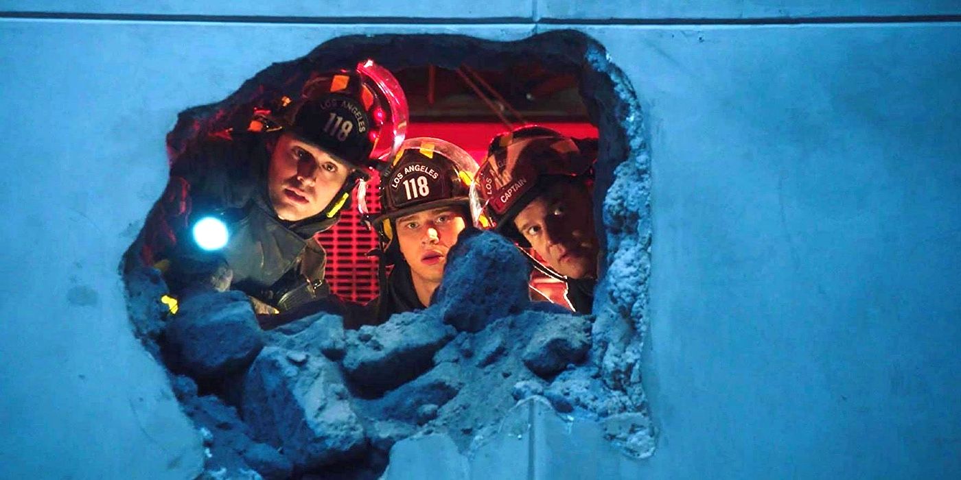 three firefighters looking through a hole in the wall in 9-1-1
