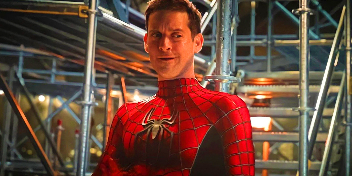 tobey maguire as peter parker standing on statue of liberty scaffolding in spider-man no way home
