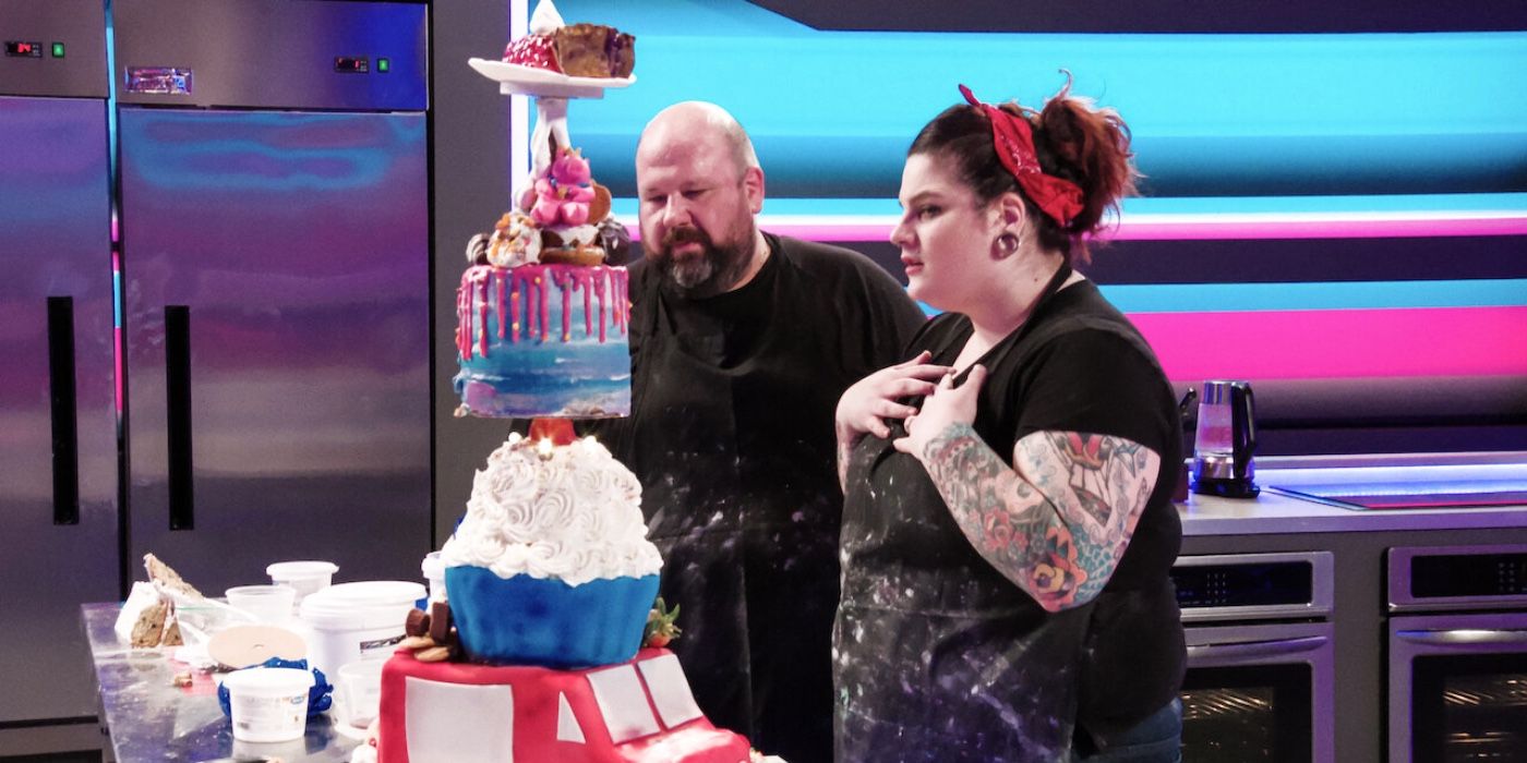 Two contestants looking at their cake in Sugar Rush Extra Sweet