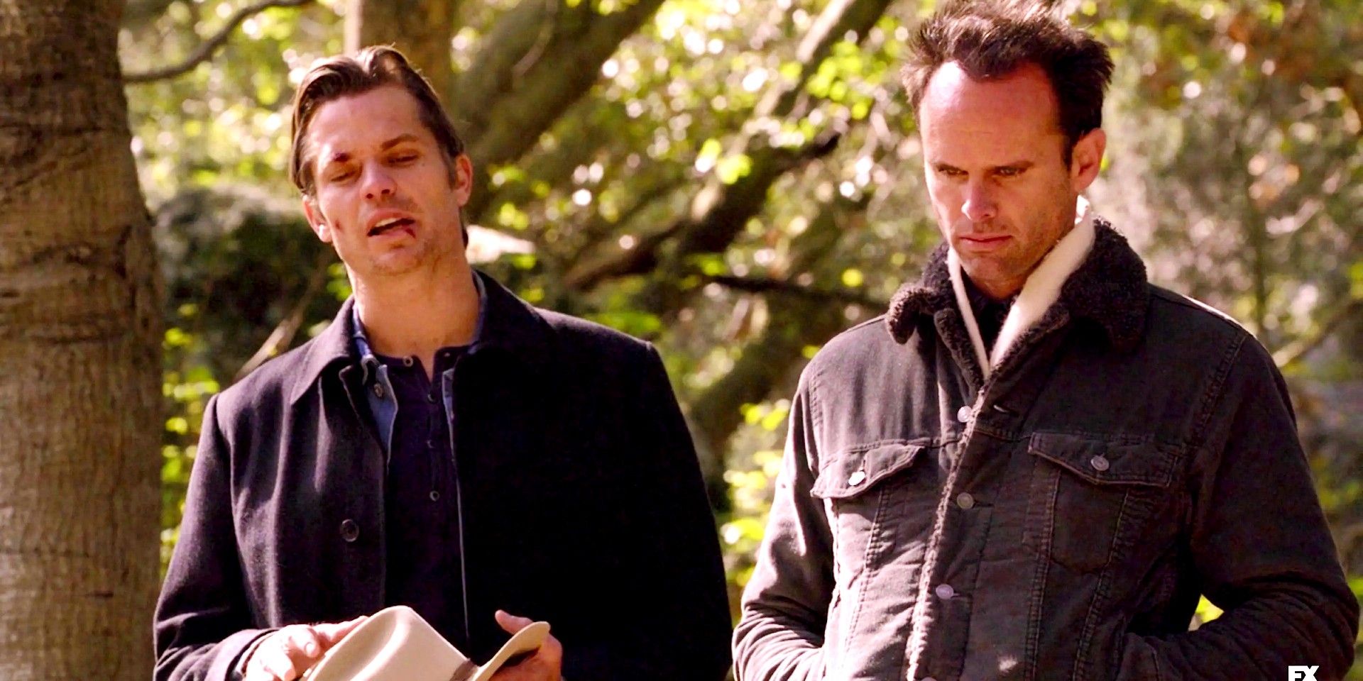 A battered Raylan and Boyd walking together in Justified