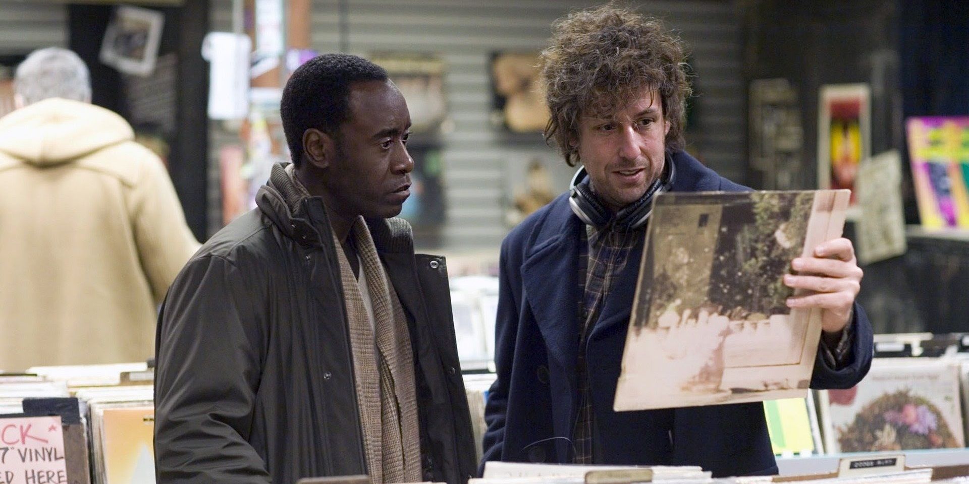 Adam Sandler and Don Cheadle in a record store in Reign Over Me