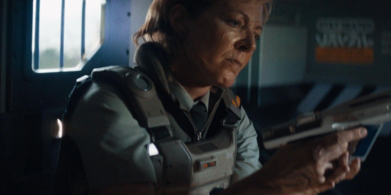 Allison Janney holding a gun in The Creator